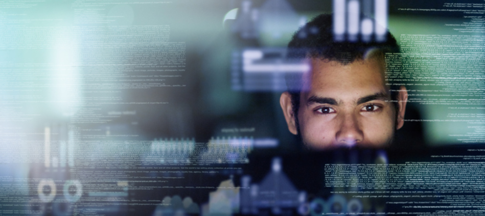 A man looking through an advanced computer interface.